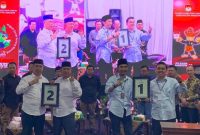 Pengundian nomor urut pasangan calon (Paslon) Pilkada 2024 Kabupaten Madiun di kantor KPU Kabupaten Madiun pada Senin malam (23/9/2024).